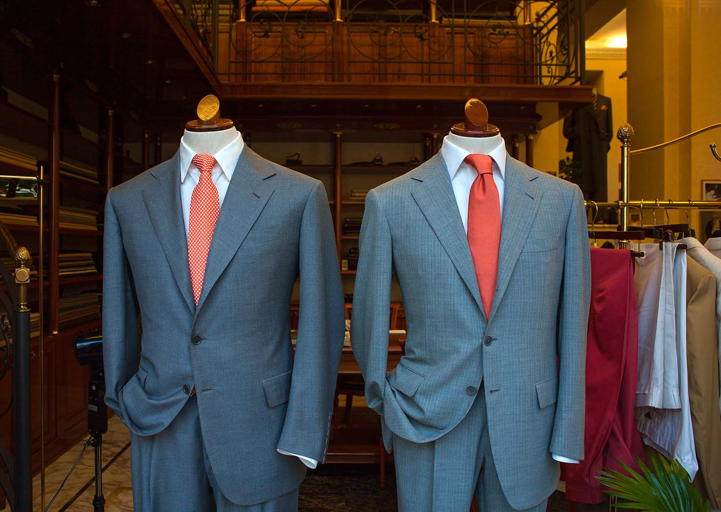 two grey suits in display